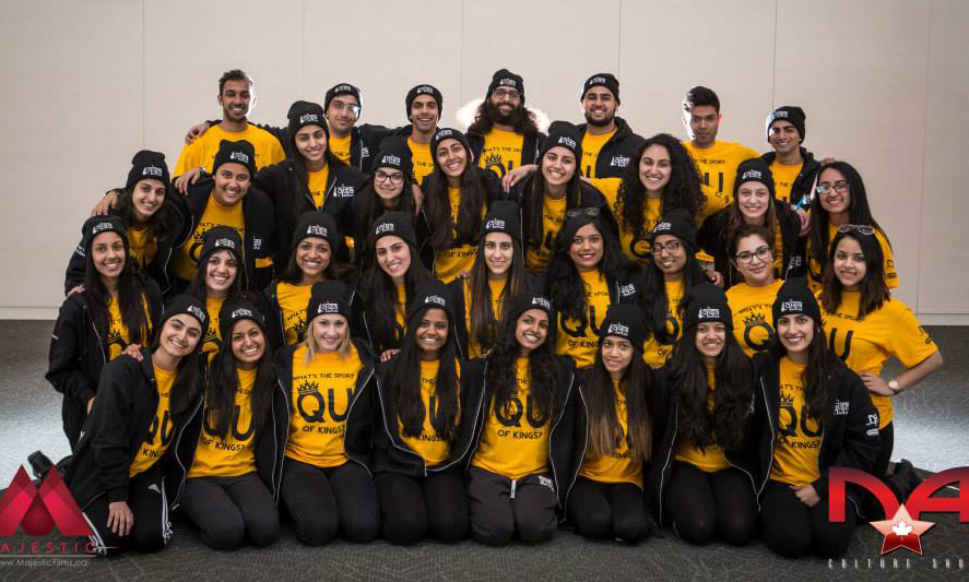 Black embroidered toques representing their university for the dance competition along with mustard colour custom t-shirts.