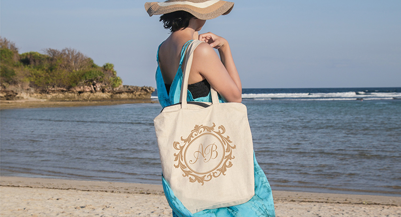 Customized beach tote with personalized logo.