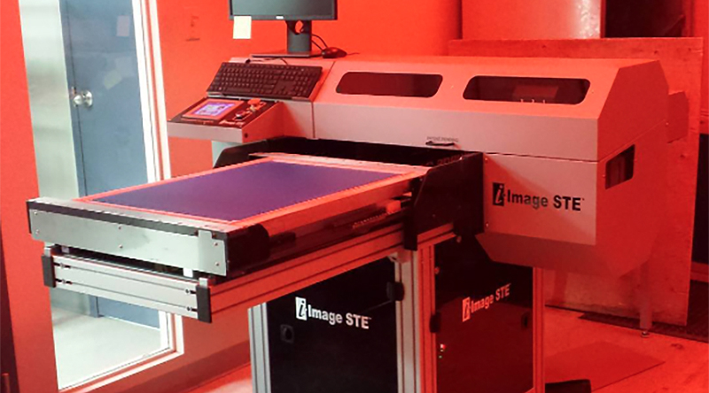 Entripy's new direct-to-screen machine, i-image STE, for all custom apparel orders.