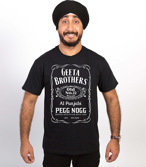 Performing artist, Jus Reign, wearing a black custom printed t-shirt with his event name.