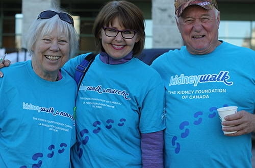 Participants at Kidney Walk charity event displaying sky blue custom printed t-shirts with custom design.
