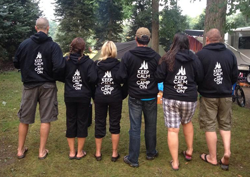A group of campers wearing custom hooded sweatshirts with their custom design.