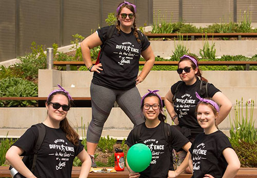 Group of girls displaying the Trek For Teens customized t-shirts in black.