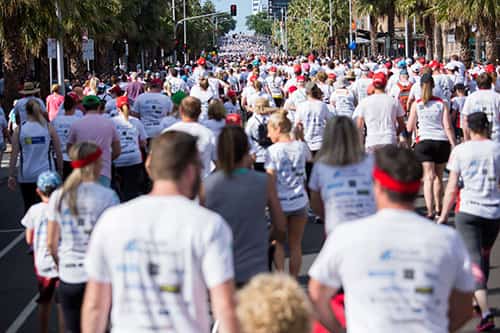 Not-for-profit fundraising walk with custom t-shirts and embroidered hats and sun visors.