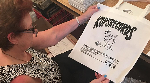 Kop's Records printed custom design on their white custom tote bags for their customers.