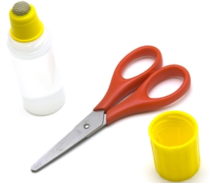 Scissor and glue to be used for turning tshirts into a bag
