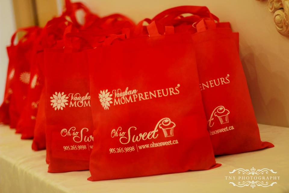 Client's custom printed tote bag with company logo.
