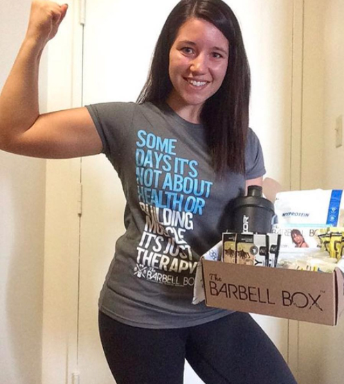 Client of Barbell Box displaying custom t-shirt with inspirational message for health and fitness.