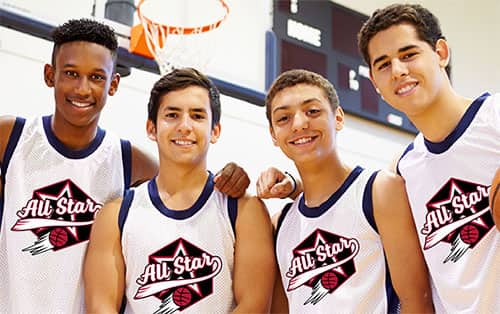 custom jerseys on basketball players for a school team.