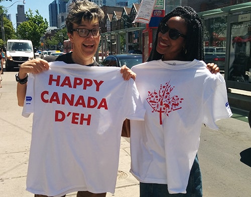 Canada Day custom t-shirts given out to people walking on the street in Toronto.